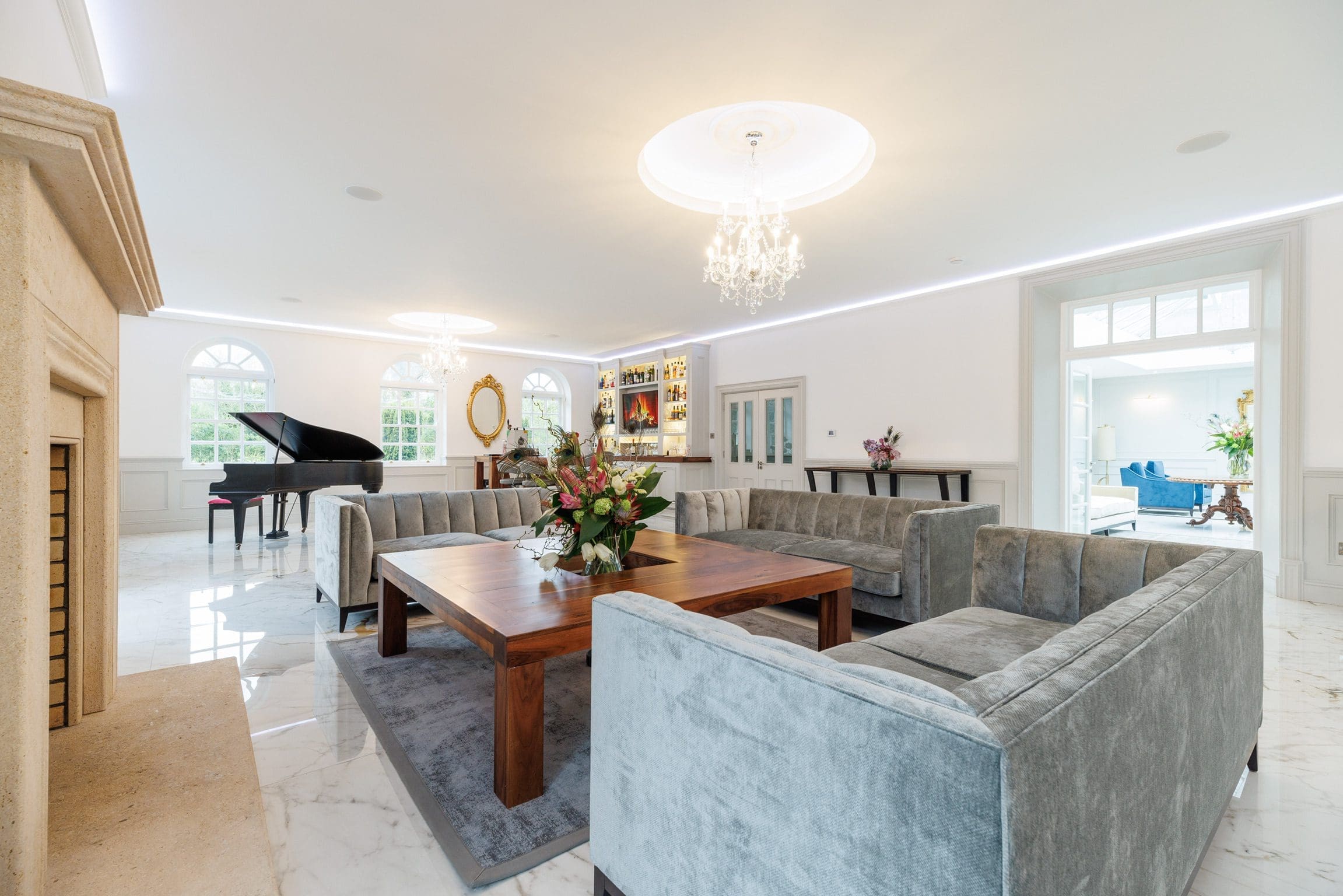ballroom_view_fireside_baby_grand_piano_bar_distance_rochtaine