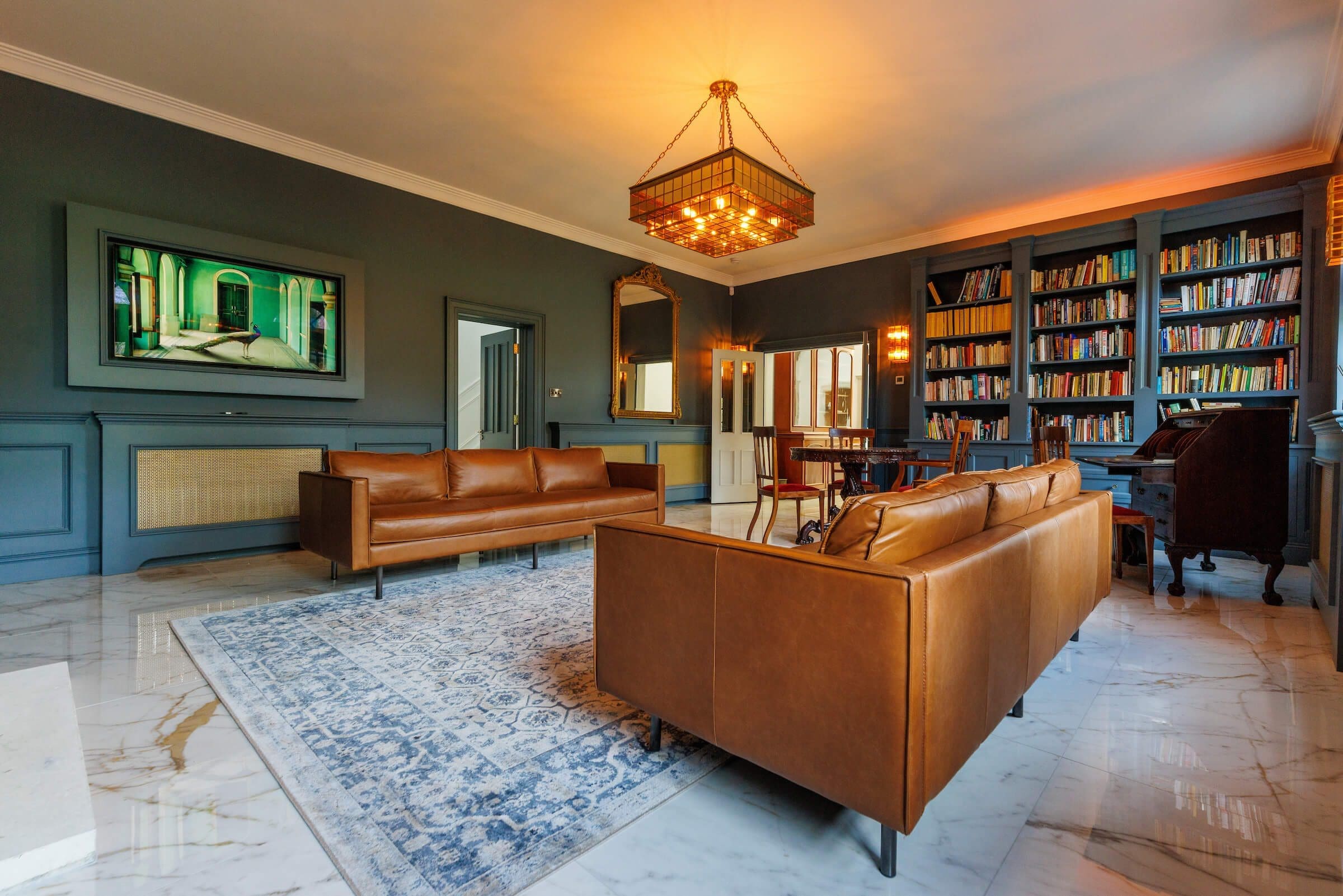 Leather couches in the library of Rochtaine Mansion.