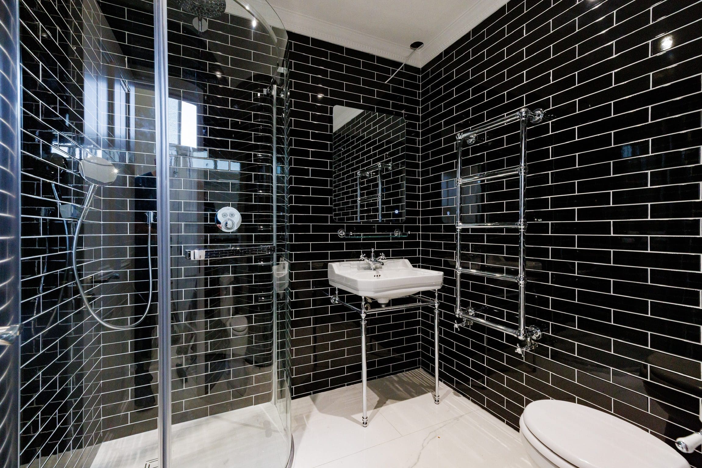 Shower and bathroom facilities in the gym and wellness area at Rochtaine Mansion