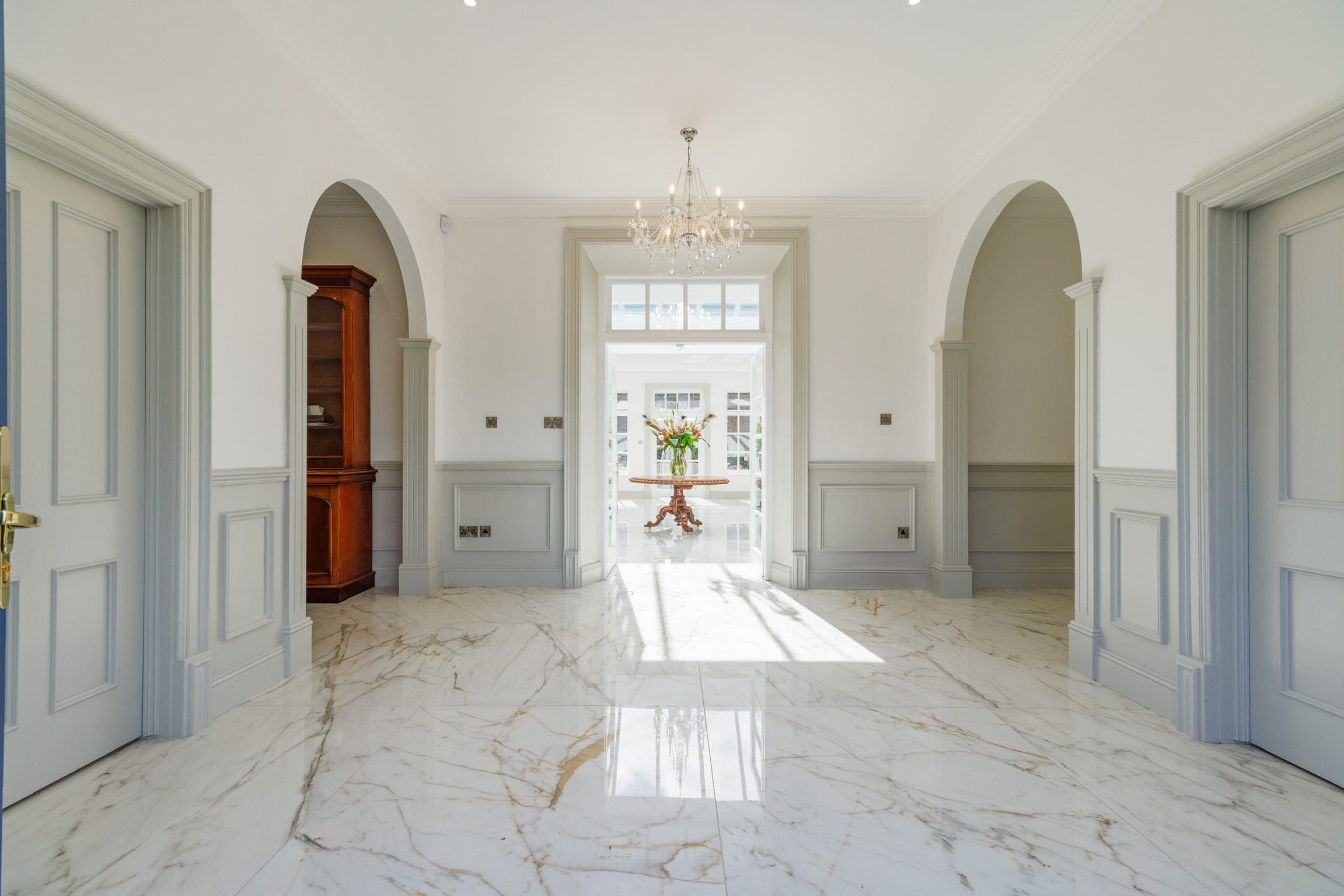 White marble entrance hallway in Rochtaine Mansion.